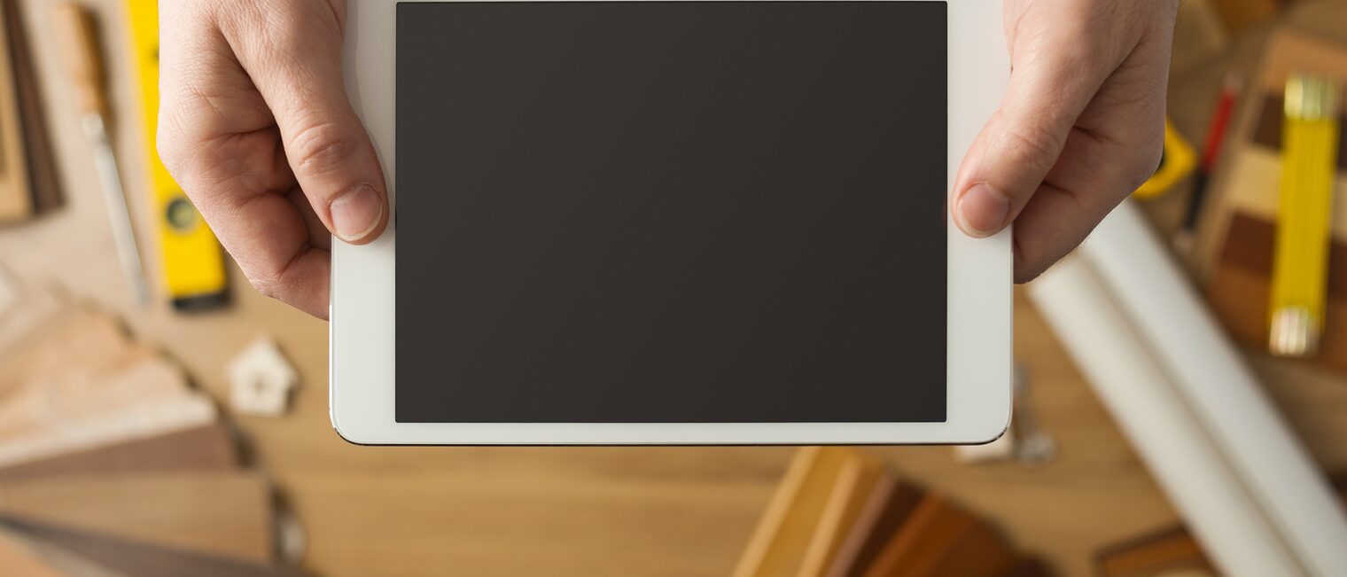 Craftsman holding a digital tablet