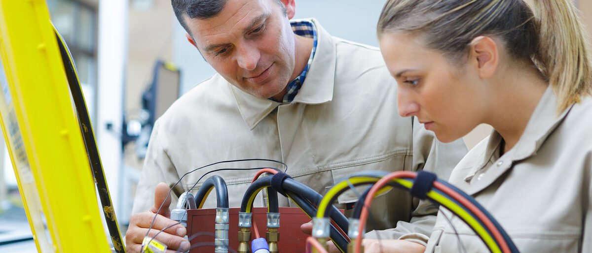 woman working on electronic factory Schlagwort(e): woman, man, cables, factory, apprentice, apprenticeship, camera, caucasian, engineer, engineering, female, girl, glasses, happy, horizontal, indoors, industry, learning, looking, manual, manufacturing, occupation, one, overalls, people, person, portrait, protective, smiling, teenage, tool, trainee, training, uniform, worker, working, workman, workshop, young, 1, woman, man, cables, factory, apprentice, apprenticeship, camera, caucasian, engineer, engineering, female, girl, glasses, happy, horizontal, indoors, industry, learning, looking, manual, manufacturing, occupation, one, overalls, people, person, portrait, protective, smiling, teenage, tool, trainee, training, uniform, worker, working, workman, workshop, young, 1